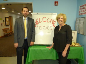 Sandi Camhi and Mike Matuszewski, Assistant Director of the Massapequa Library welcome Friends to the annual meeting.